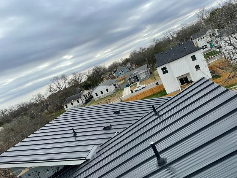 Standing seam metal roof panels with vents for Skylight Repair in Hampton